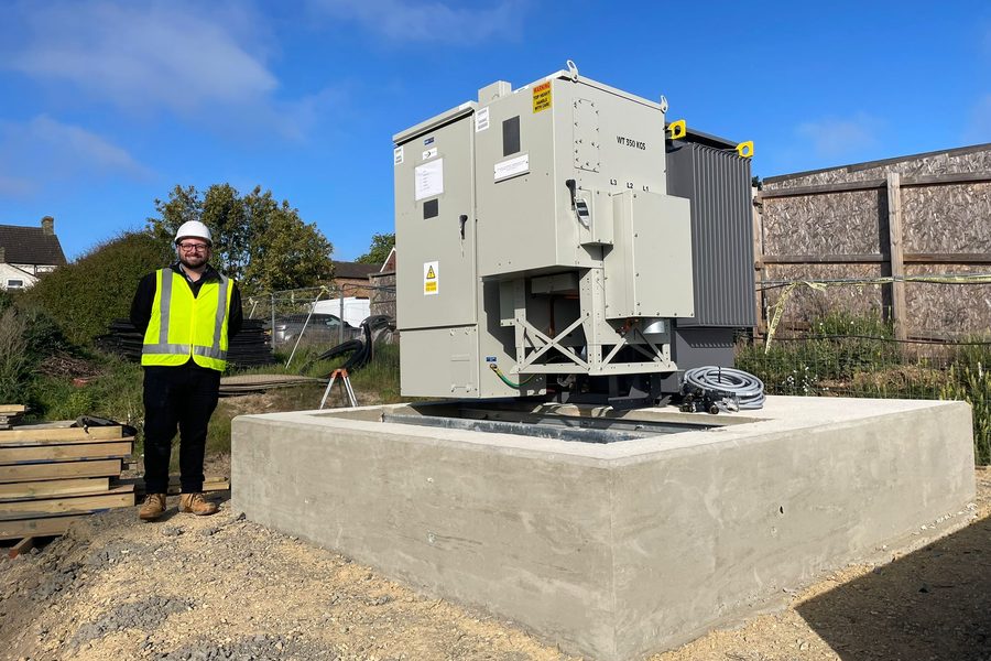 Completed package substation on its pre-cast plinth at a commercial grid feed site in Woking